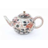 18th century Japanese Imari teapot, painted with flowers, 17cm from spout to handle