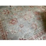 Good quality Ushak style carpet, with meandering lotus leaf ornament on moss green ground, 310 x 250