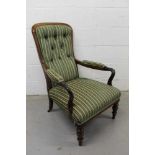 Victorian rosewood framed open elbow easy chair with buttoned striped upholstery