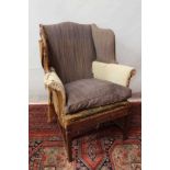Small Georgian style wing chair of good proportions, standing on square legs