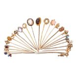 Collection of Victorian and Edwardian stick pins to include an opal and diamond cluster, peridot and