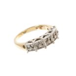 Diamond dress ring with five square clusters of brilliant cut diamonds on gold shank. Ring size N.
