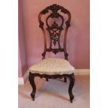 Victorian mahogany high back side chair with pierced scroll back, padded seat on cabriole legs