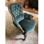 Victorian walnut button back chair, with button upholstered spoon shaped back on carved cabriole leg