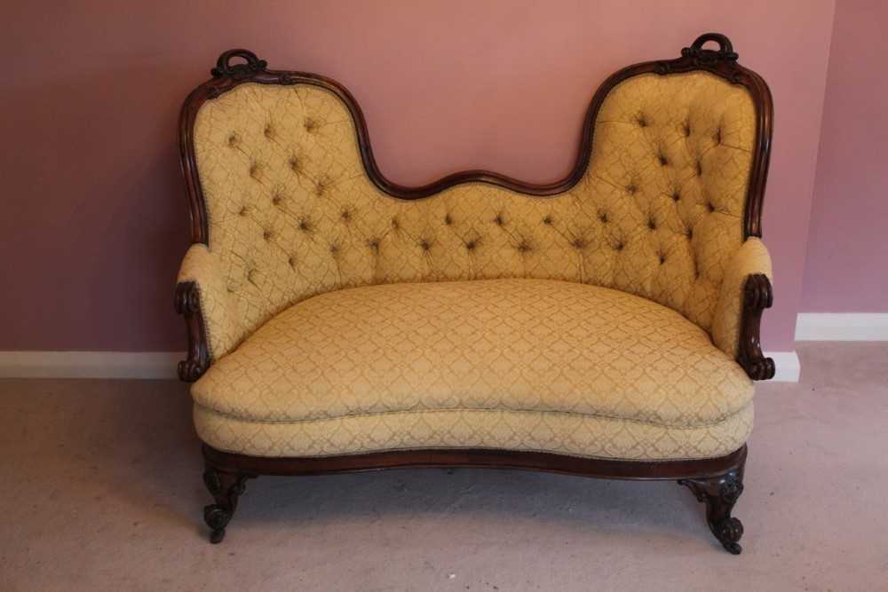 Good quality Victorian rosewood framed double ended sofa upholstered in buttoned material, carved ro