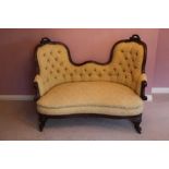 Good quality Victorian rosewood framed double ended sofa upholstered in buttoned material, carved ro
