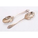 Pair of Edwardian silver serving spoons with pierced decoration