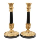 Pair of 19th century bronzed and ormolu single candlesticks
