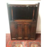 Unusual 18th century oak cupboard, the recess with shaped apron and turned baluster supports, the cu