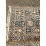 Indian rug with formal foliate reserves