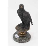 Bronze figure of an eagle, raised on circular marble base