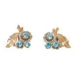 Pair of 1940s/1950s blue zircon white and yellow gold floral spray earrings with clip fittings