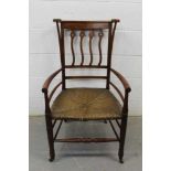 Arts and Crafts fruitwood and caned armchair in the manner of William Birch for Liberty's