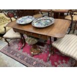 Regency mahogany and ebony line inlaid sofa table, with rounded rectangular drop leaf top over twin