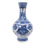 A Chinese blue and white vase with styalised leaf, floral and dragon decoration