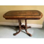 Victorian figured walnut and ebonised banded card table, of rounded rectangular form on fluted colum