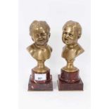 Pair of antique bronze busts of children