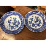Pair of blue and white Japanese plates depicting music and literature