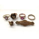 Group gold including Victorian brooch, on earring and four gem set rings