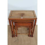 Nest of three Chinese hardwood side tables