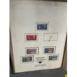 Two albums of world stamps including early 20th century stamps, and a quantity of First Day Covers