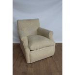 Early 20th century arm chair upholstered in neutral fabric