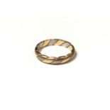 Yellow and white metal rope twist style ring