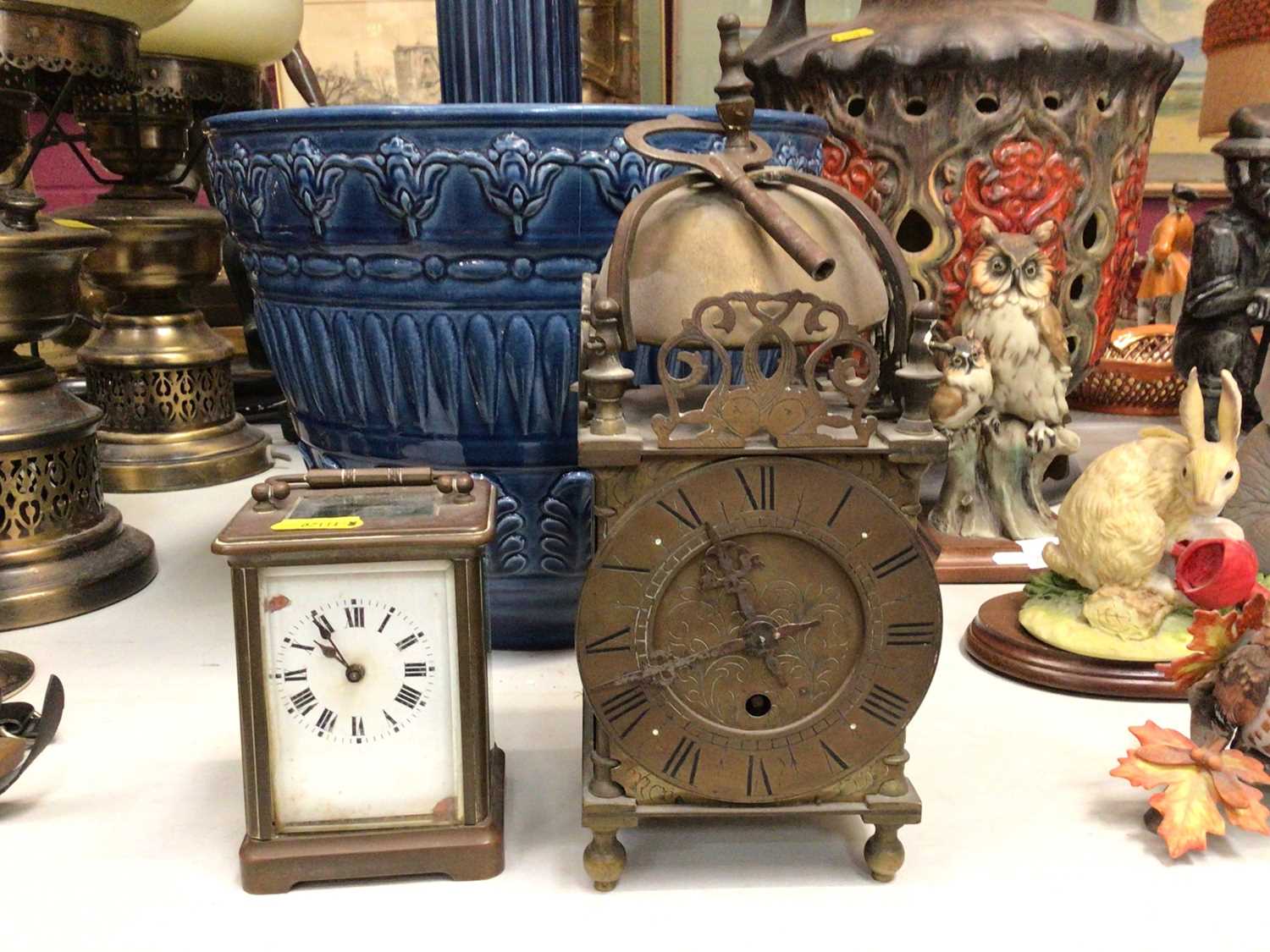 Brass lantern clock and carriage clock