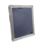 Large Contemporary silver photograph frame of rectangular form with reeded deocration, and a two way