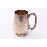 George V silver tankard of tapered cylinderical form with loop handle on circular foot, (Birmingham