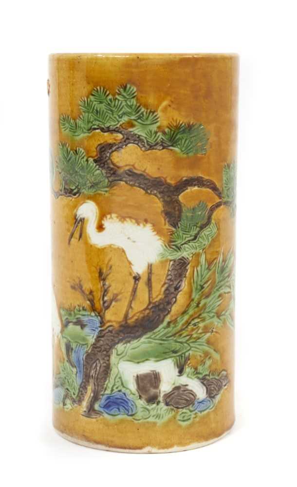 A Chinese sleeve vase, 20th century, decorated in the Sancai style with two cranes, seal mark to bas