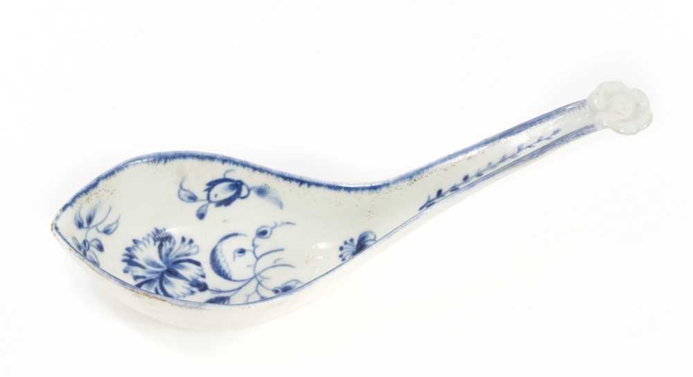 A rare Worcester blue and white rice spoon, painted with the Gillyflower pattern, crescent mark to b