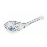 A rare Worcester blue and white rice spoon, painted with the Gillyflower pattern, crescent mark to b