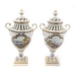 A pair of good quality 20th century Dresden porcelain urns and covers, painted with harbour scenes o