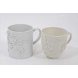 A Bow blanc de chine cup and coffee can, circa 1750, both prunus moulded, 6cm and 6.25cm high