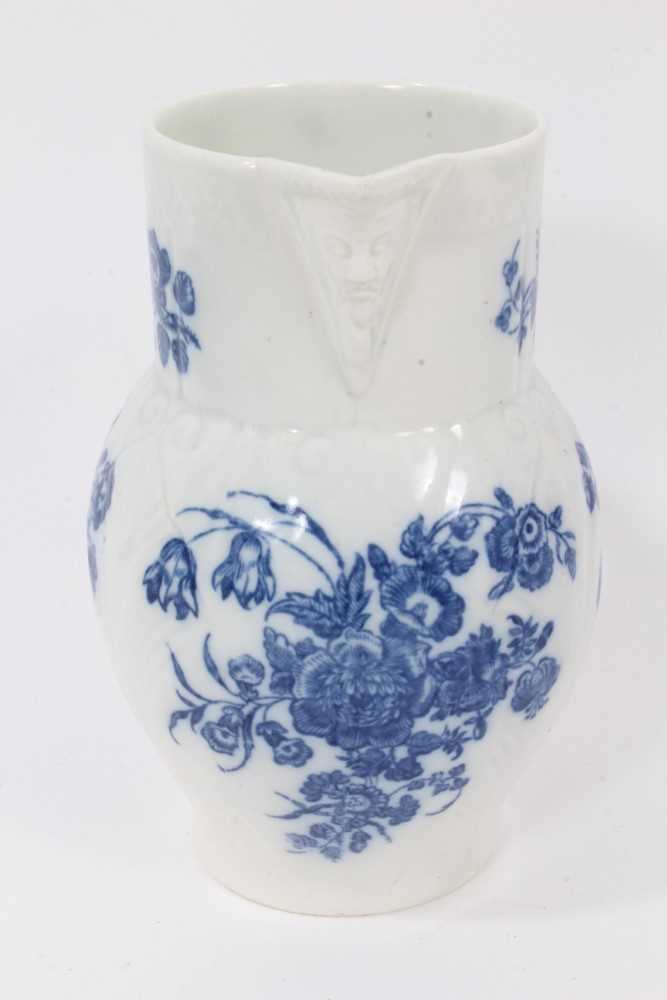 A Caughley blue and white cabbage leaf moulded jug with mask spout, decorated with bouquets of flowe - Image 2 of 5