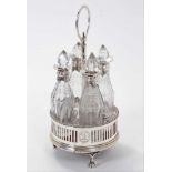 George III silver four piece cruet of circular pierced form, with bead border