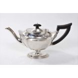 late Victorian silver batchelor teapot of oval fluted form, with hinged domed cover