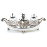 Victorian silver inkstand of boat shaped form, with bead edge and scroll handles