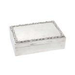 George V silver box of rectangular form in the Arts & Crafts style with planished decoration and hin