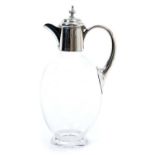 Late Victorian silver mounted cut glass claret jug, with hinged cover (London 1898) William Comyns