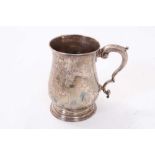 George III silver tankard of baluster form with scroll handle on circular foot, (London 1765), maker