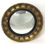 Regency style gilt convex wall mirror