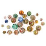 Collection of Victorian glass spiral twist marbles