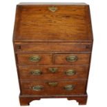 Early 18th century oak bureau, of diminutive proportions