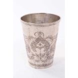 Persian silver beaker of tapered cylinderical form, with engraved decoration depicting birds and scr