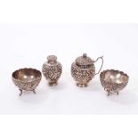 Japanese silver four piece cruet set comprising mustard pot, pepperette and pair of salt cellars, wi