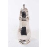 1930s silver sugar caster of octagonal form with slip pierced cover on a stepped octagonal base