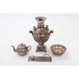 Middle Eastern white metal samovar with engraved decoration, together with matching cup and teapot a