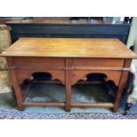 Victorian Gothic pitch pine table with carved gothic foliage on square chamfered legs joined by stre